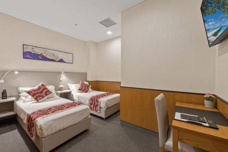 Quality Inn Hotel Кигали Екстериор снимка